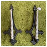 Cast metal candleholders, 17 inches tall each
