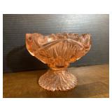 Pink Depression glass pedestal dish