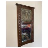 Wooden wall mirror with brass ship inlay