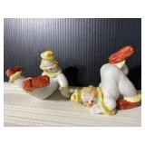Playful ceramic clown duo