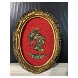 Vintage oval frame Spartan portrait on red felt