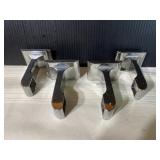 Four chrome towel bar holders