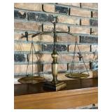 Vintage wood and brass scales of justice