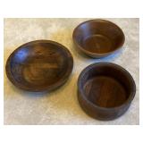 Three wooden bowls