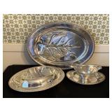 Three silver plate serving dishes