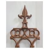 Tall ornate cast iron garden trellis
