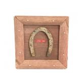 C. 1844 mounted antique horseshoe