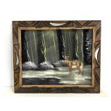 Deer scene painting on cloth in carved frame