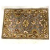 Small accent floral rug