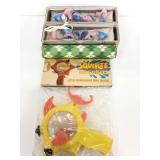 Baby teething rings, kaleidoscope, & squirt gun