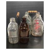 Vintage glass milk bottles with carriers