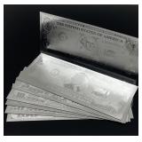 Set of US dollars pressed in 24k white gold