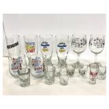 Lot of various drinking themed glasses