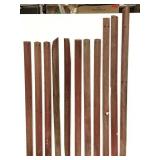 Eleven red painted reclaimed wood pieces