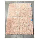 Two new Room Essentials blush accent rugs