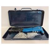 Rivet tool in metal case
