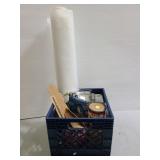 Wood stain, plastic sheeting, and stir sticks