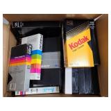 Box of assorted brands of blank VHS tapes
