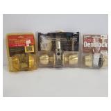 Three unopened deadbolt lock sets