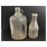 Two vintage glass bottles