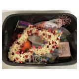 Tote of assorted holiday decor
