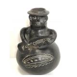 Homemade pottery musician bud vase