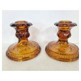 Pair of amber glass candlestick holders