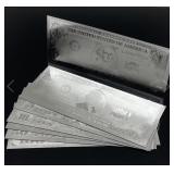 Set of US dollars pressed in 24k white gold