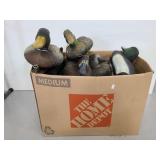 Box of plastic decoy ducks
