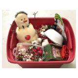 Tote of Christmas decorations and serving dishes