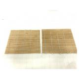 Two sushi rolling mats