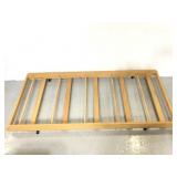 Wooden toddler treadle bed frame on caster wheels