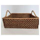 Small woven basket with handles