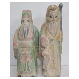 Carved wood Asian man figurines