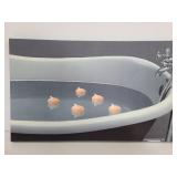 Light up candles in a bathtub canvas print