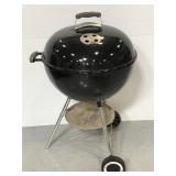 Weber charcoal powered grill w/ utensils & cover