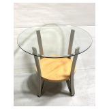 Circular glass top side table with chrome legs