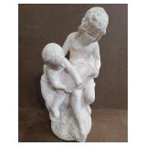 Painted Terracotta children reading statue