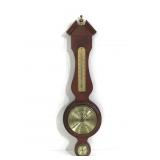 Vintage wooden barometer thermometer