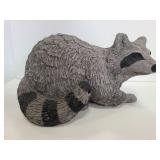 Racoon cement statue