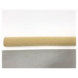 Long gold leaf covered foam circular couch pillow