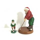 Pair of golfing Santa Claus resin statues