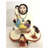 "The Story Teller" pottery made painted figurine
