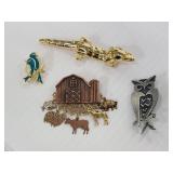 Four vintage animal pins