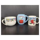 Three peanuts Christmas mugs