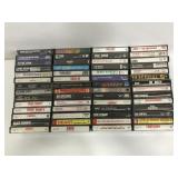 48 cassette tapes w/ Beatles, sabbath, prince ect