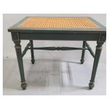 Antique rattan top green bench