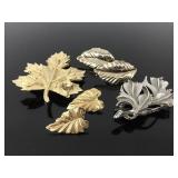 Leaf brooches and earrings