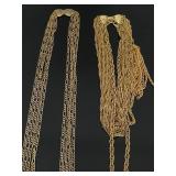Pair of vintage multi-strand gold tone necklaces