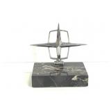 Lincoln cars hood ornament mounted on marble base